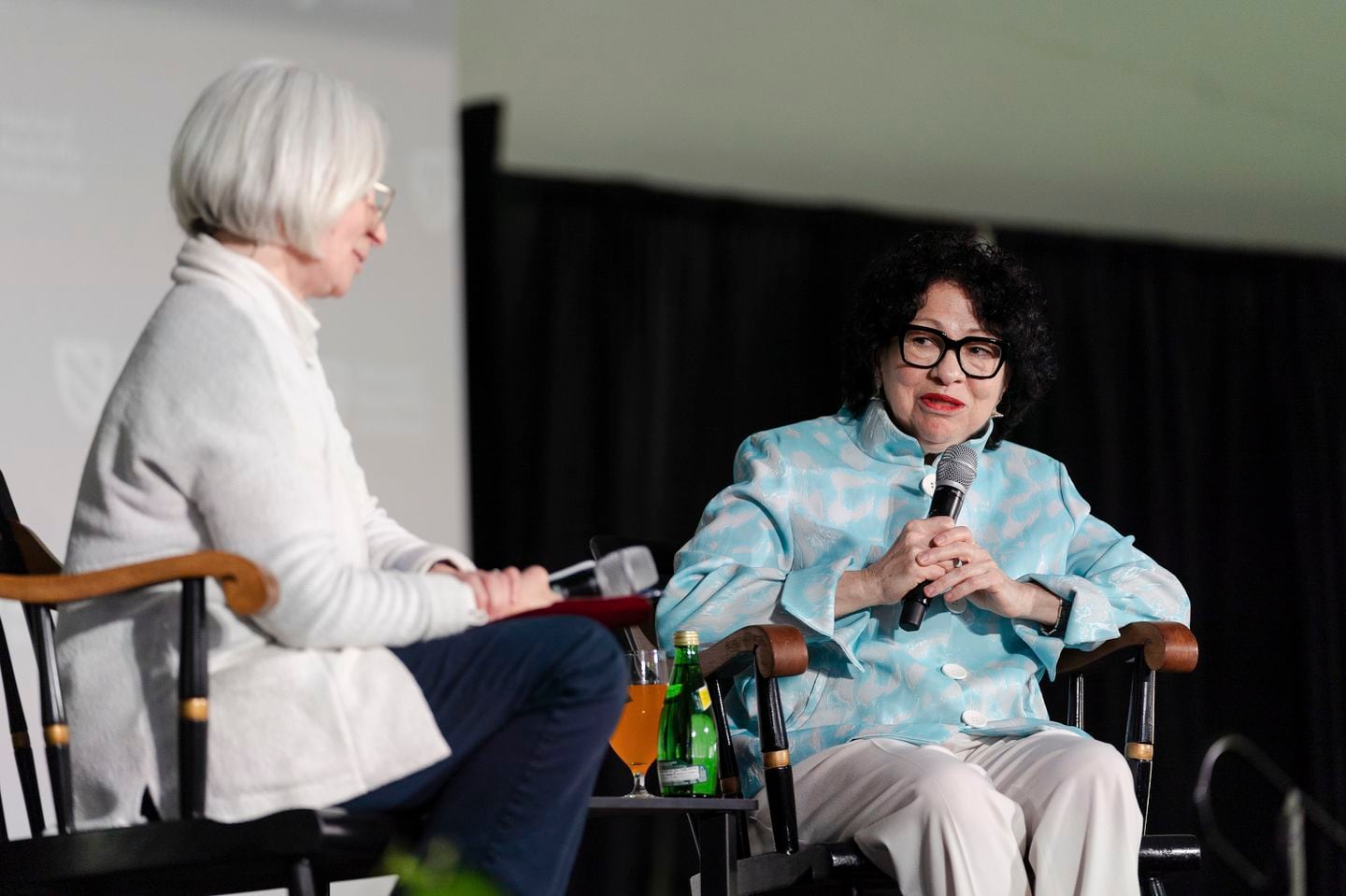 Justice Sonia Sotomayor, right, speaks with Martha Minow, former dean of Harvard Law School, on Friday, May 24.