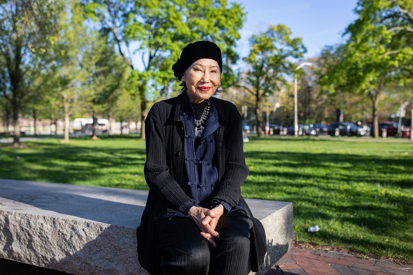 Amy Tan, pictured here in a park near Harvard Square, was recently in Cambridge on a book tour for her latest work, "The Backyard Bird Chronicles."